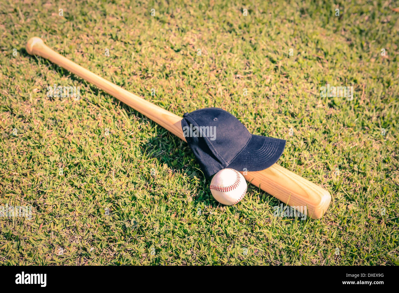 Concept photo of a Baseball Bat Ball and black hat Stock Photo Alamy