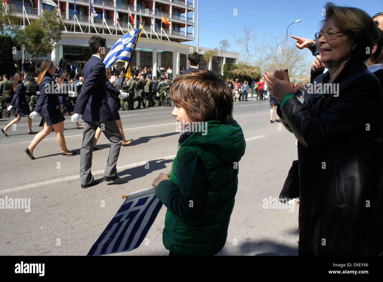 Thessaloniki, Greece. 25th March 2014. Greeks celebrated their national independence day amid tight security and protest in the northern port city of Thessaloniki, as school teachers staged a protest against planned layoffs as part of governments cost cutting reforms.  Credit:  Orhan Tsolak/Alamy Live News Stock Photo