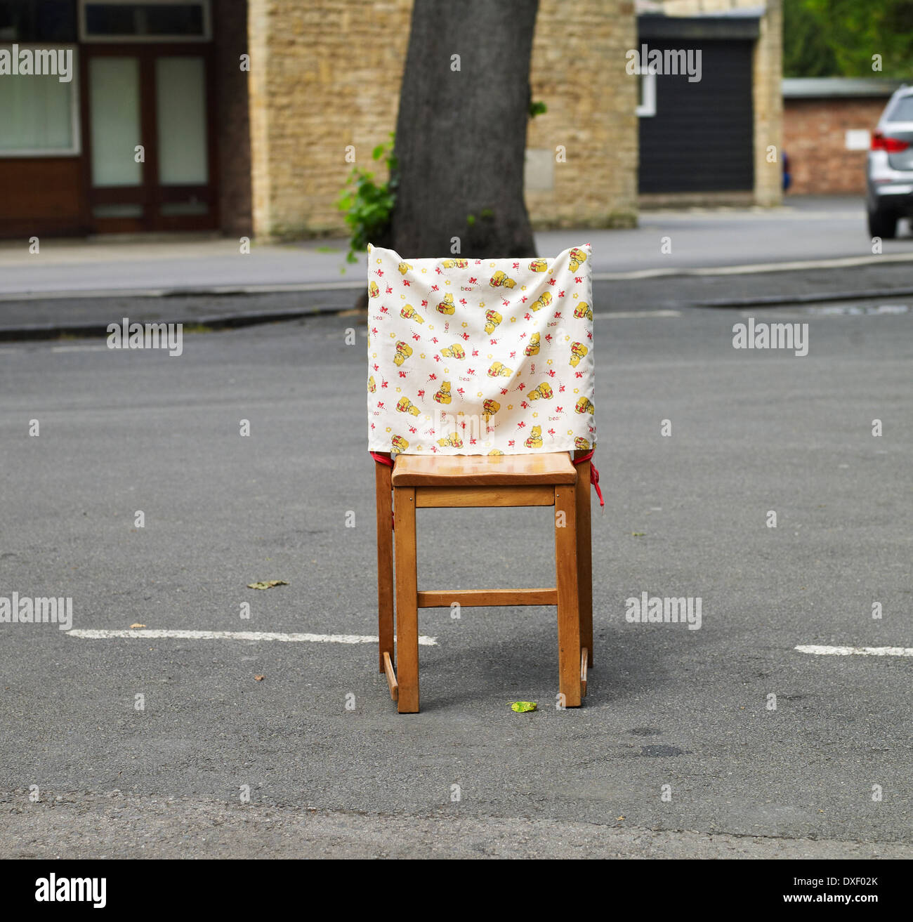 Kitchen chair in road, Stratford upon Avon Stock Photo