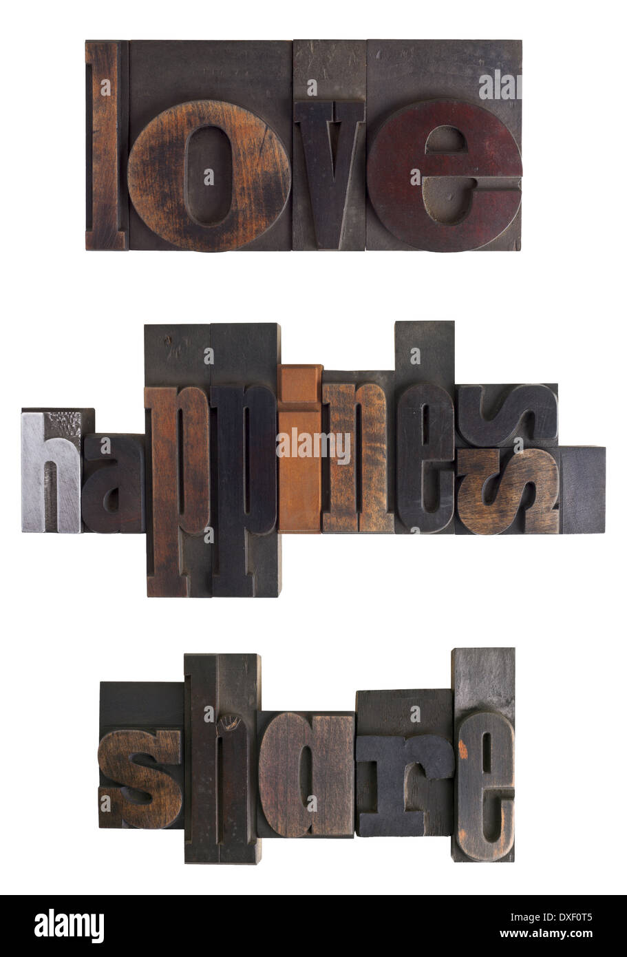 Words love, happiness, share written in vintage letterpress type, scratched and stained, isolated on white  background Stock Photo