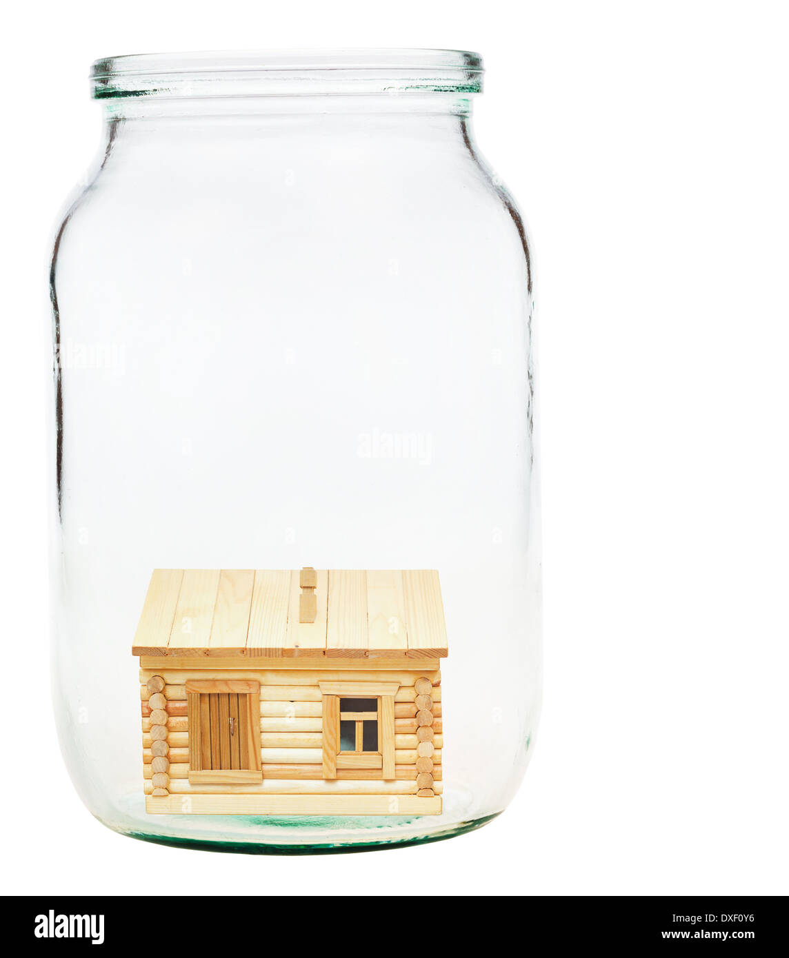 new wooden village house in open glass jar Stock Photo