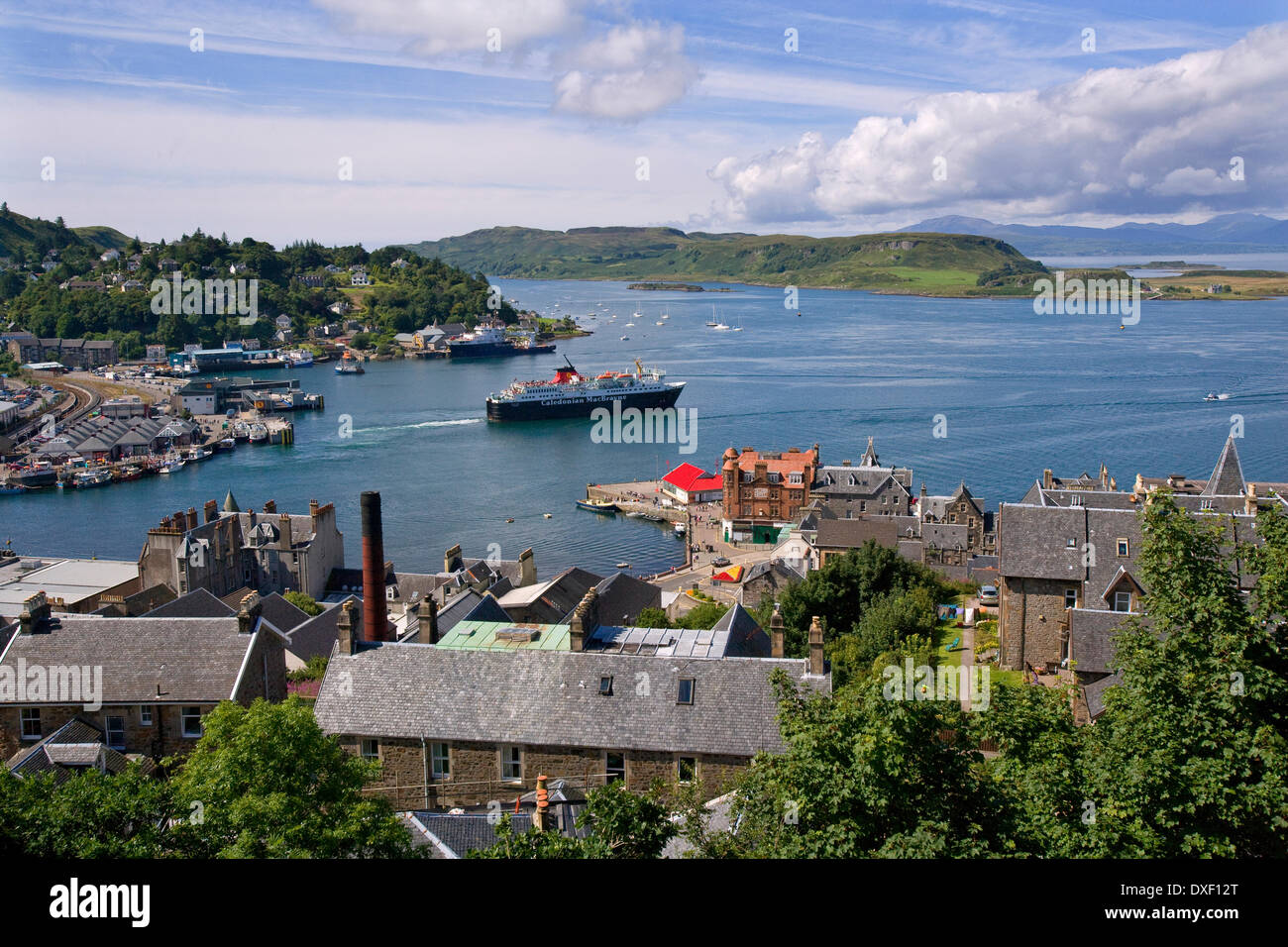 Summer view across Oban Bay towards the deaprting M.V.Isle of Mull, Oban, Argyll Stock Photo
