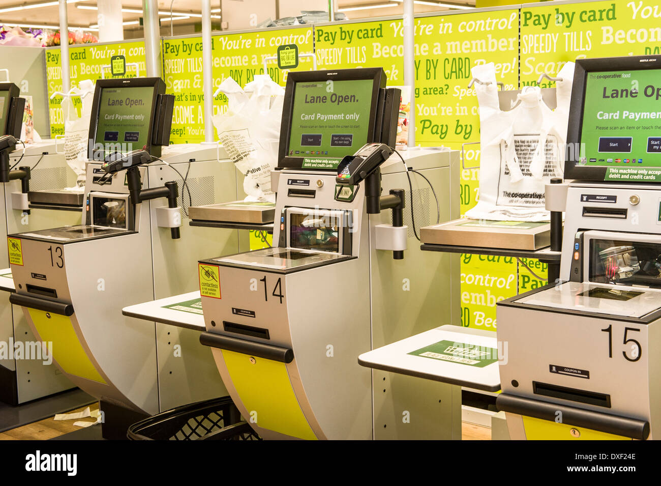 Interior photograph of the self check out tills in the Cooperative Shop, Old Street, London EC1V, UK Stock Photo