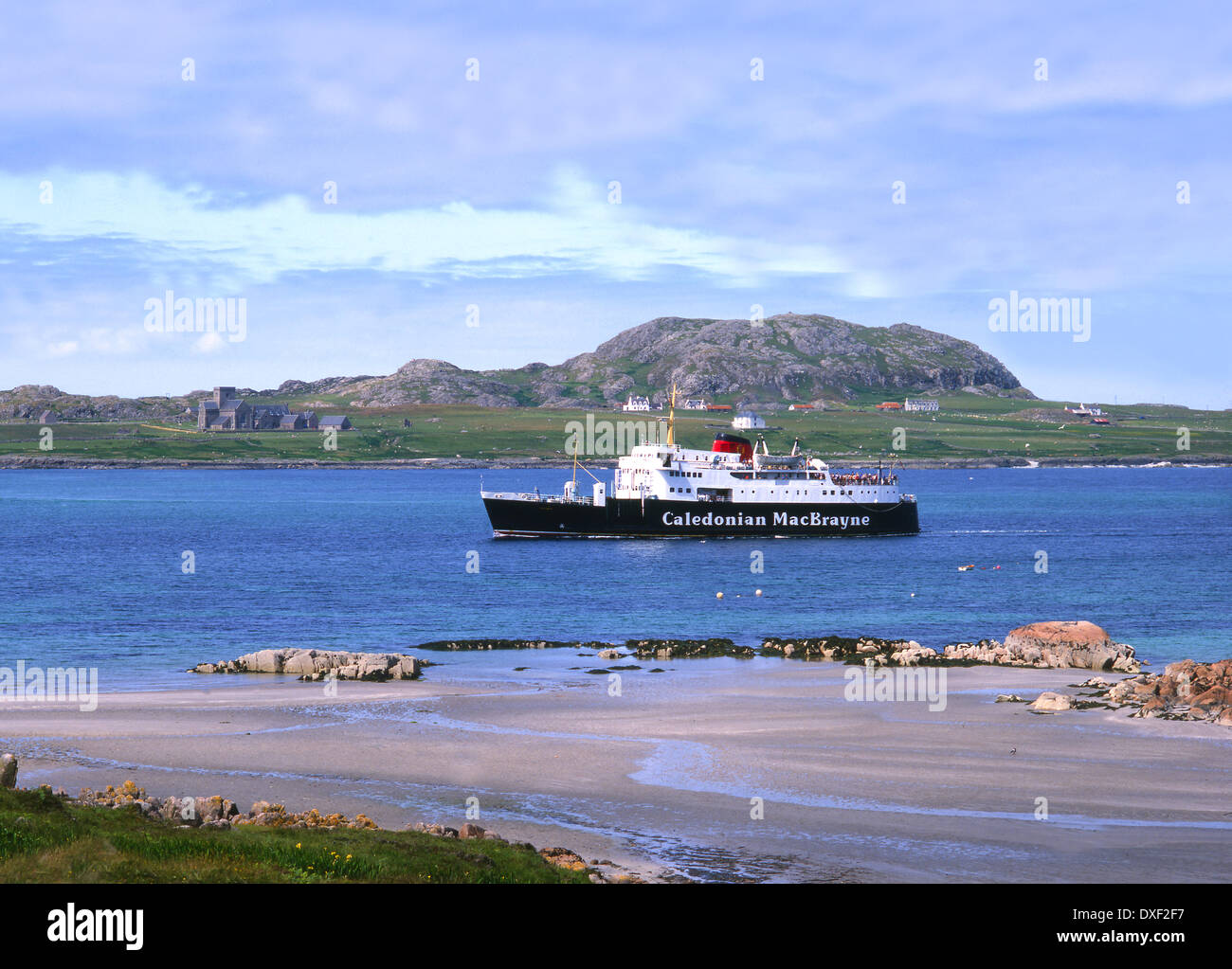 Archive image of the M.V.Columba sailing past Iona, 1980's. Stock Photo