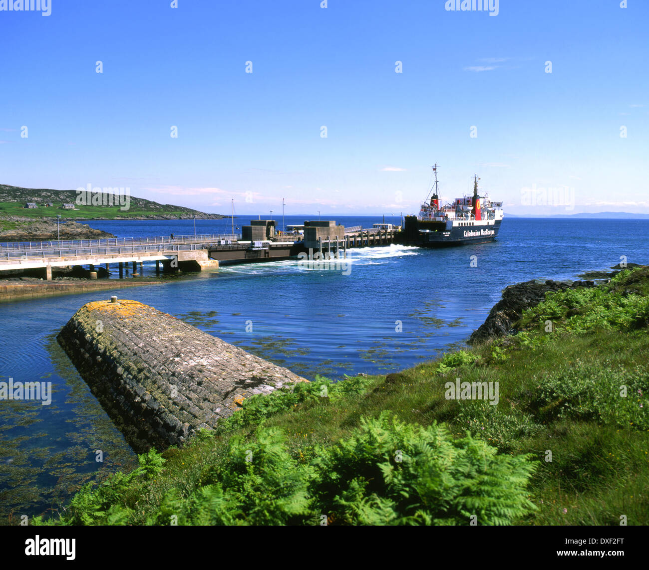 M.V.Isle of Arran departs Colonsay pier, Hebrides Stock Photo