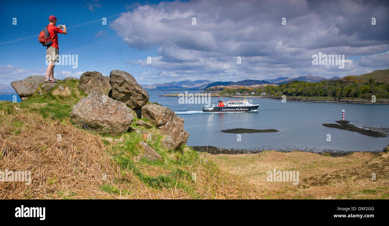 The M.V.Lord of the Isles passing the north end of Kerrera, Argyll Stock Photo