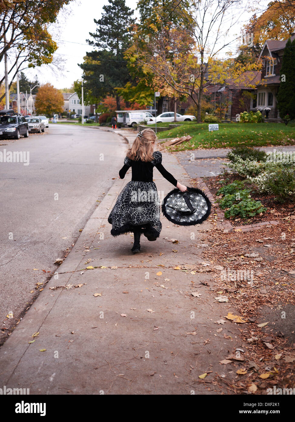 Girl Trick or Treating in Witch Costume, Toronto, Ontario, Canada Stock Photo