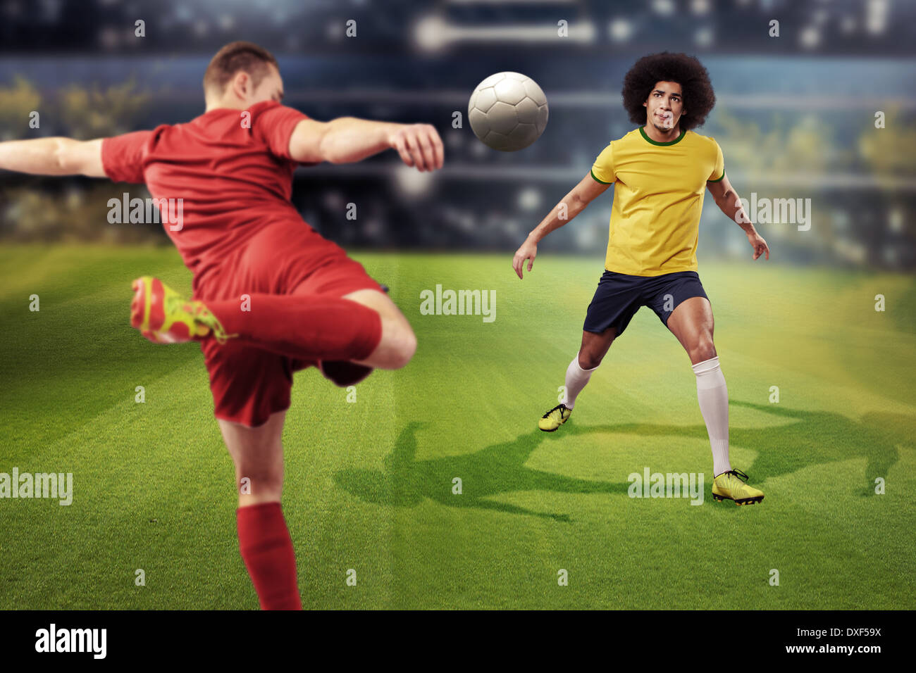 two soccer or football player on the field at a stadium Stock Photo Alamy