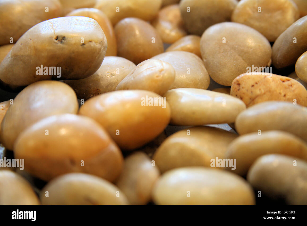 SHINY RIVER ROCKS Stock Photo