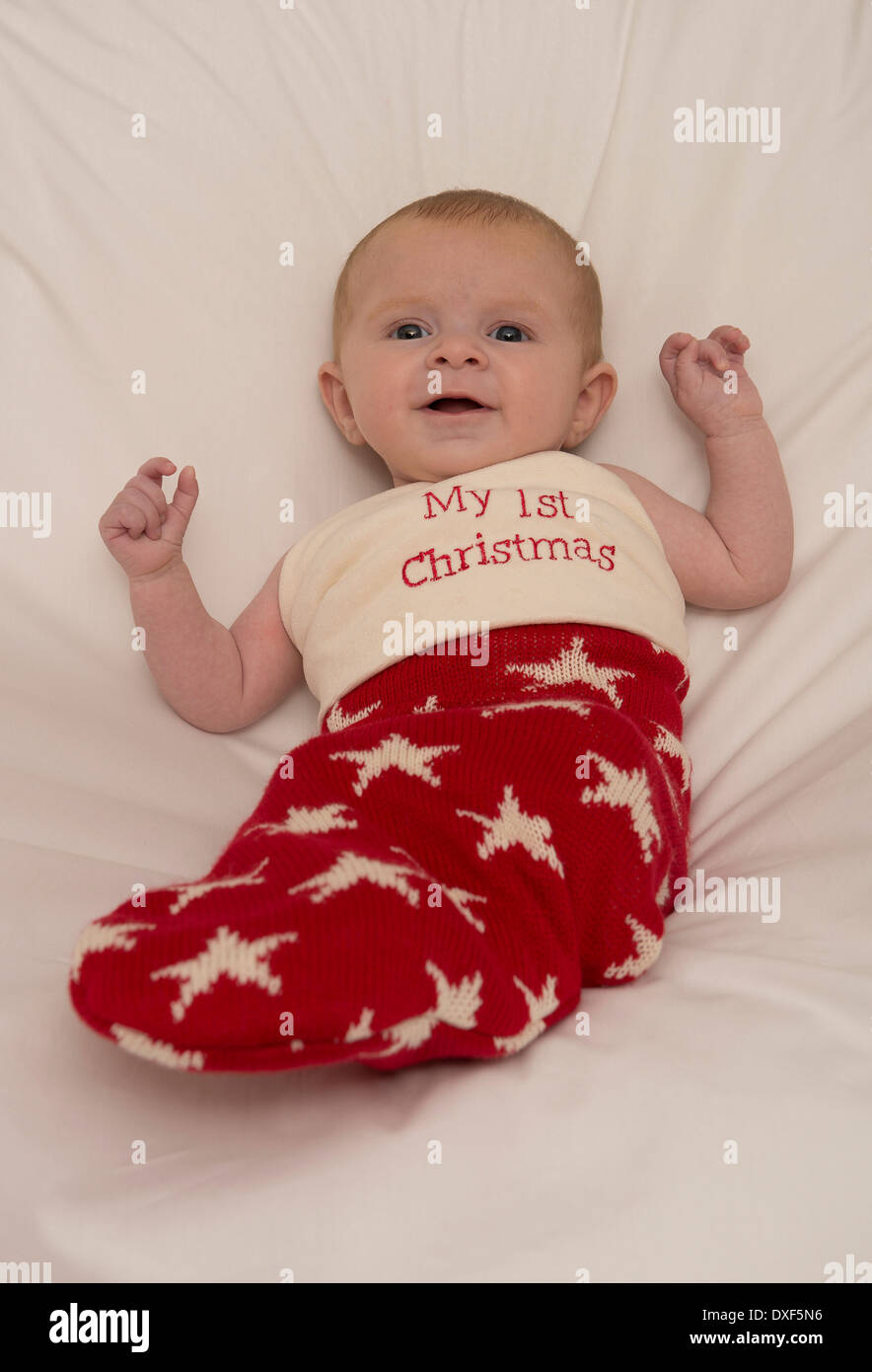 Three month old baby in a Christmas stocking Stock Photo Alamy