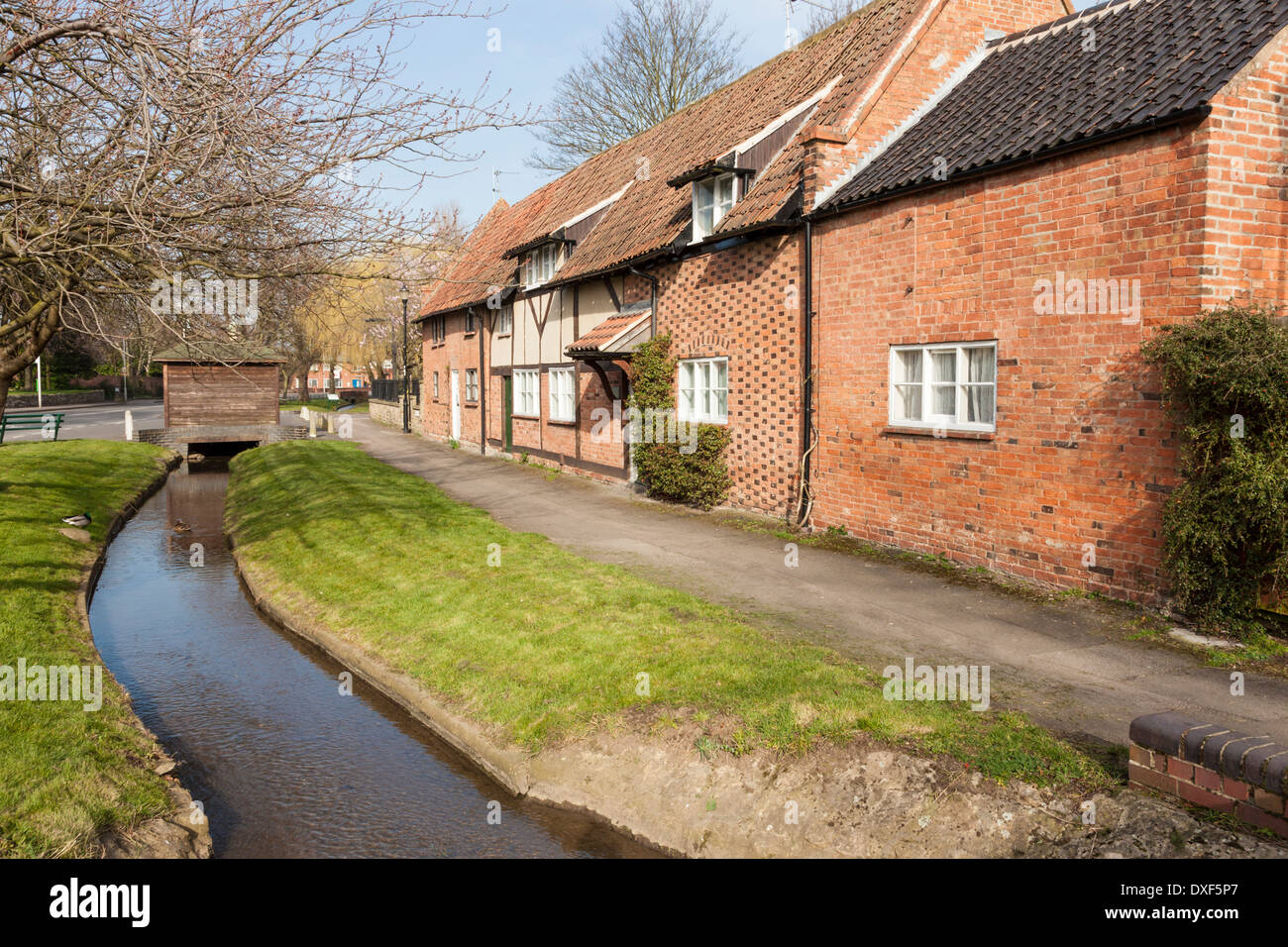 Old cottages by Sheepwash Brook in the village of East Leake