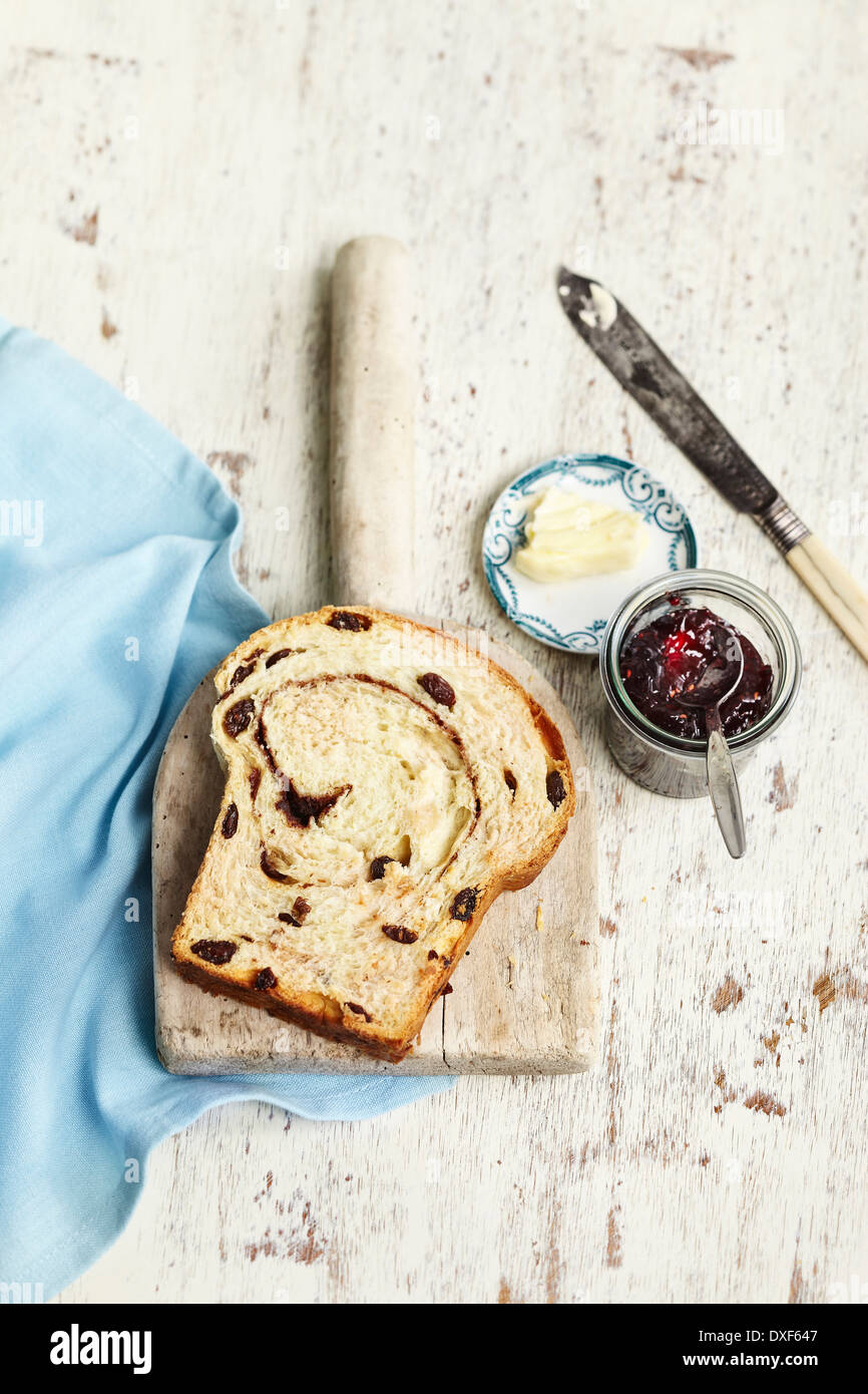 Overhead View of Slice Of Cinnamon Rasin Bread with Butter and Jam, Studio Shot Stock Photo