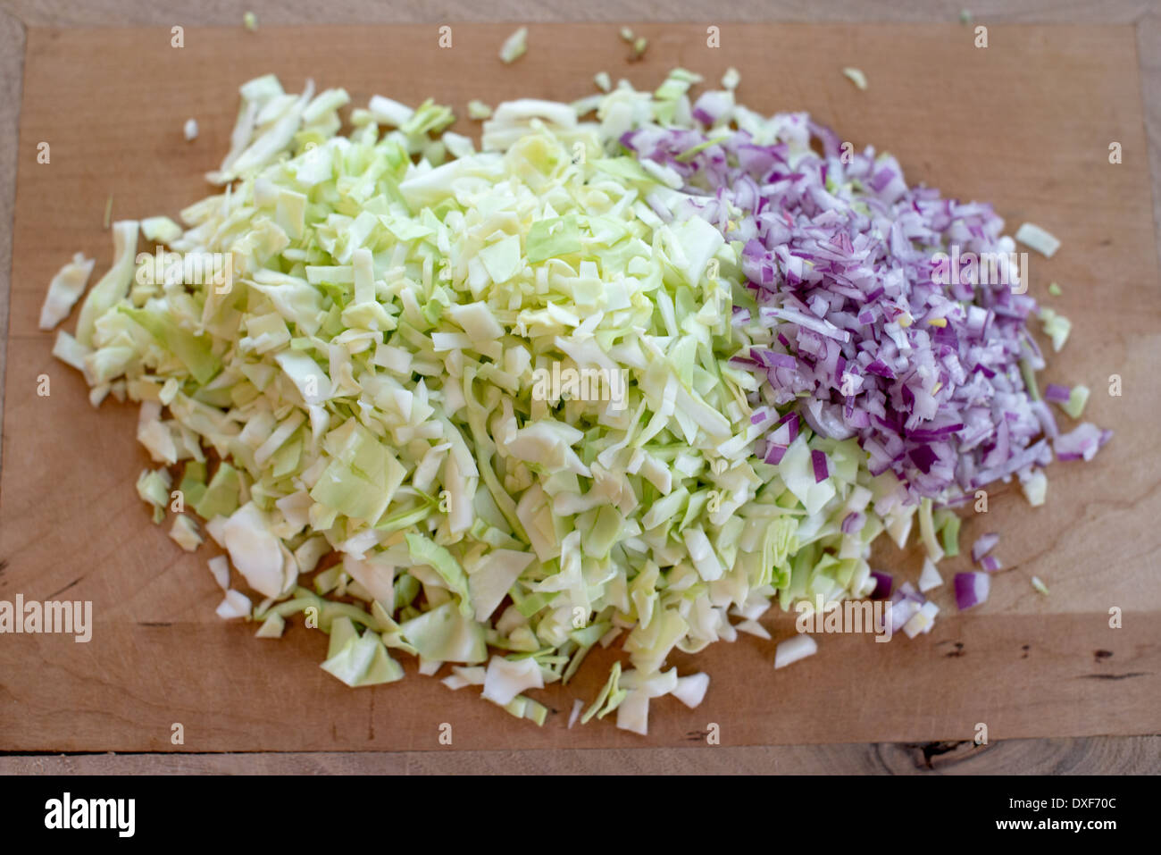Cabbage and red onion diced for slaw Stock Photo Alamy