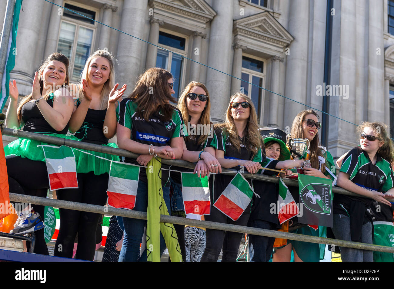Young girls on a float during the St Patricks Day Parade in London. Stock Photo