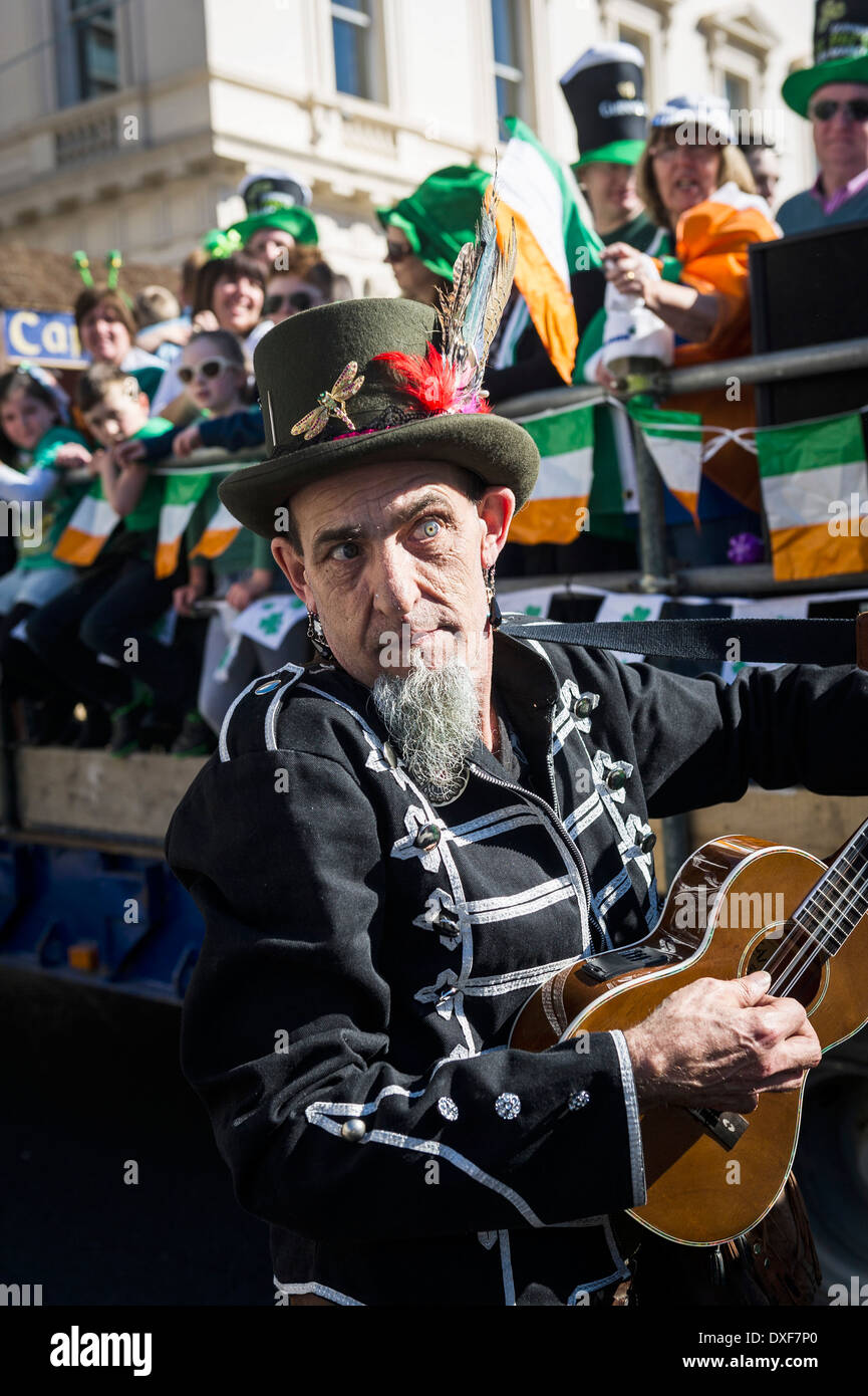 An Irish musician performing during the St Patricks Day Parade in London. Stock Photo