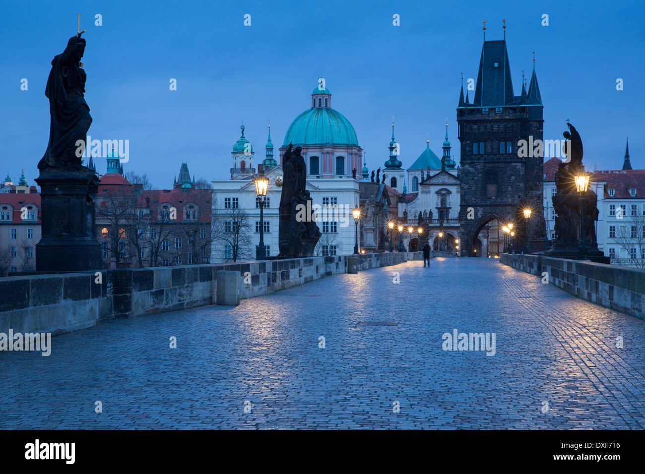 dawn on the Charles Bridge with the towers and spires of the Old Town beyond, Prague, Czech Republic Stock Photo