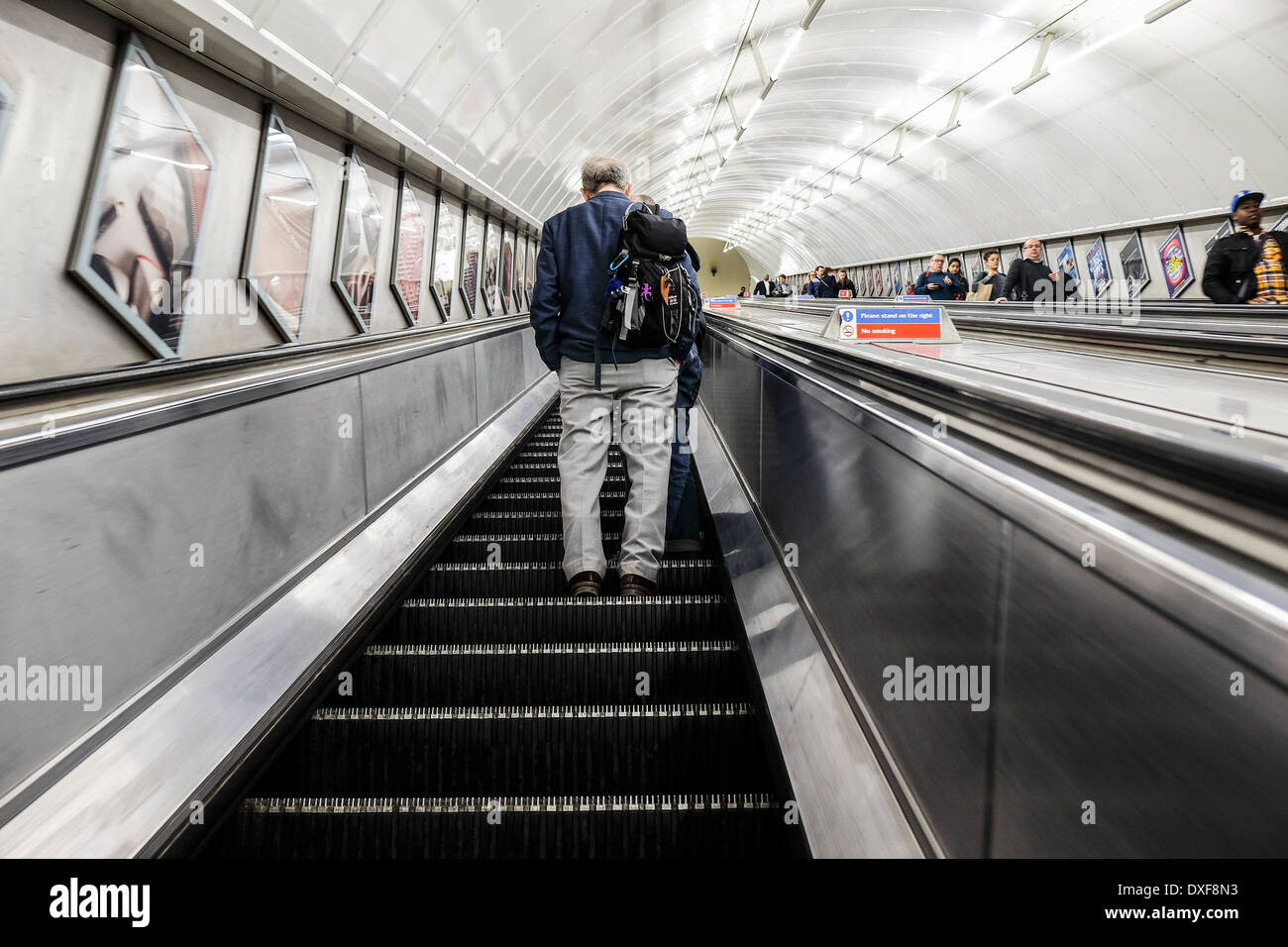Commuters travelling on an escalator Stock Photo Alamy