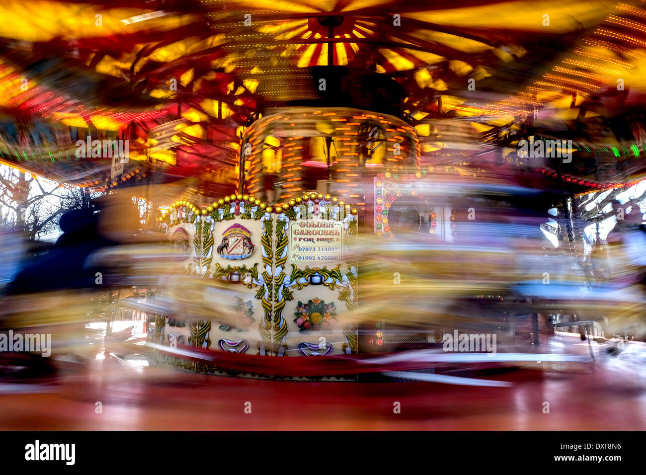 A carousel in motion. Stock Photo