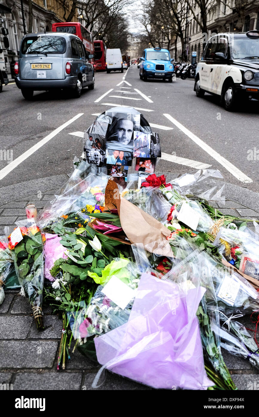 Flowers and tributes left at the accident site where John Clarke a motorcyclist died. Stock Photo