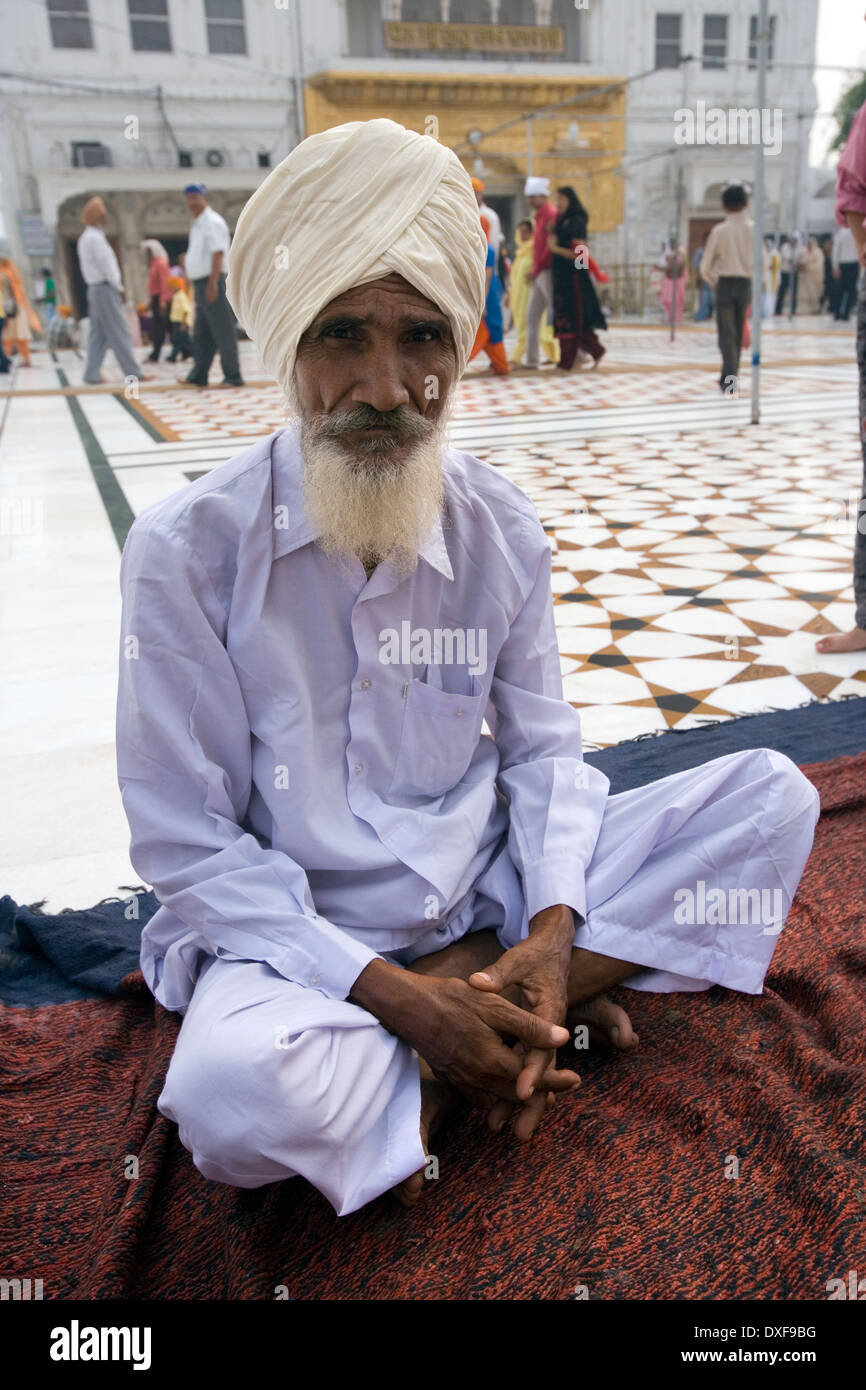 Sikh Pilgrim At The Golden Temple Complex In The Sikh City Of Amritsar In The Punjab Region Of 7063
