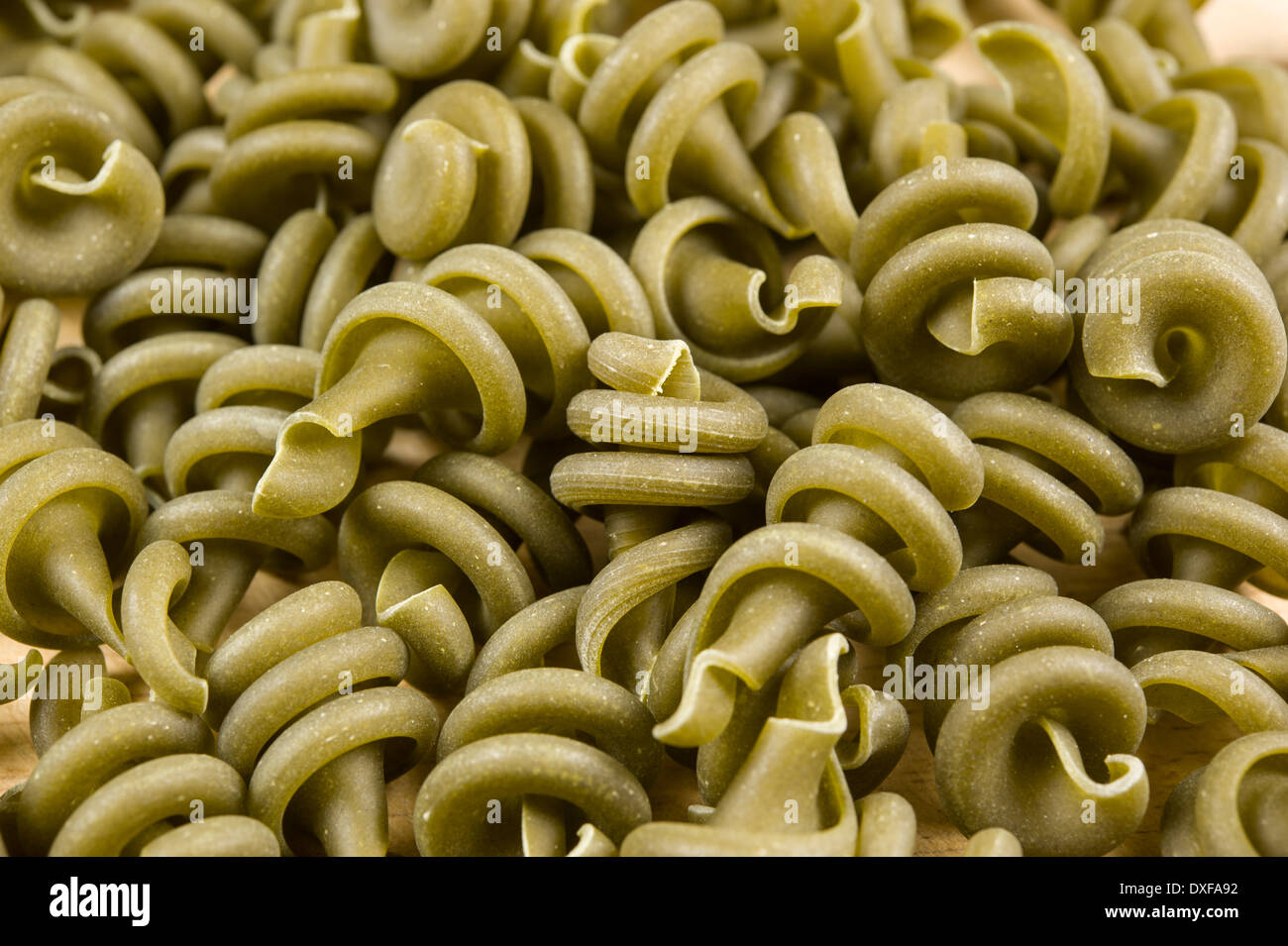 Close up, macro, micro photograph of spinach Trottole pasta Stock Photo
