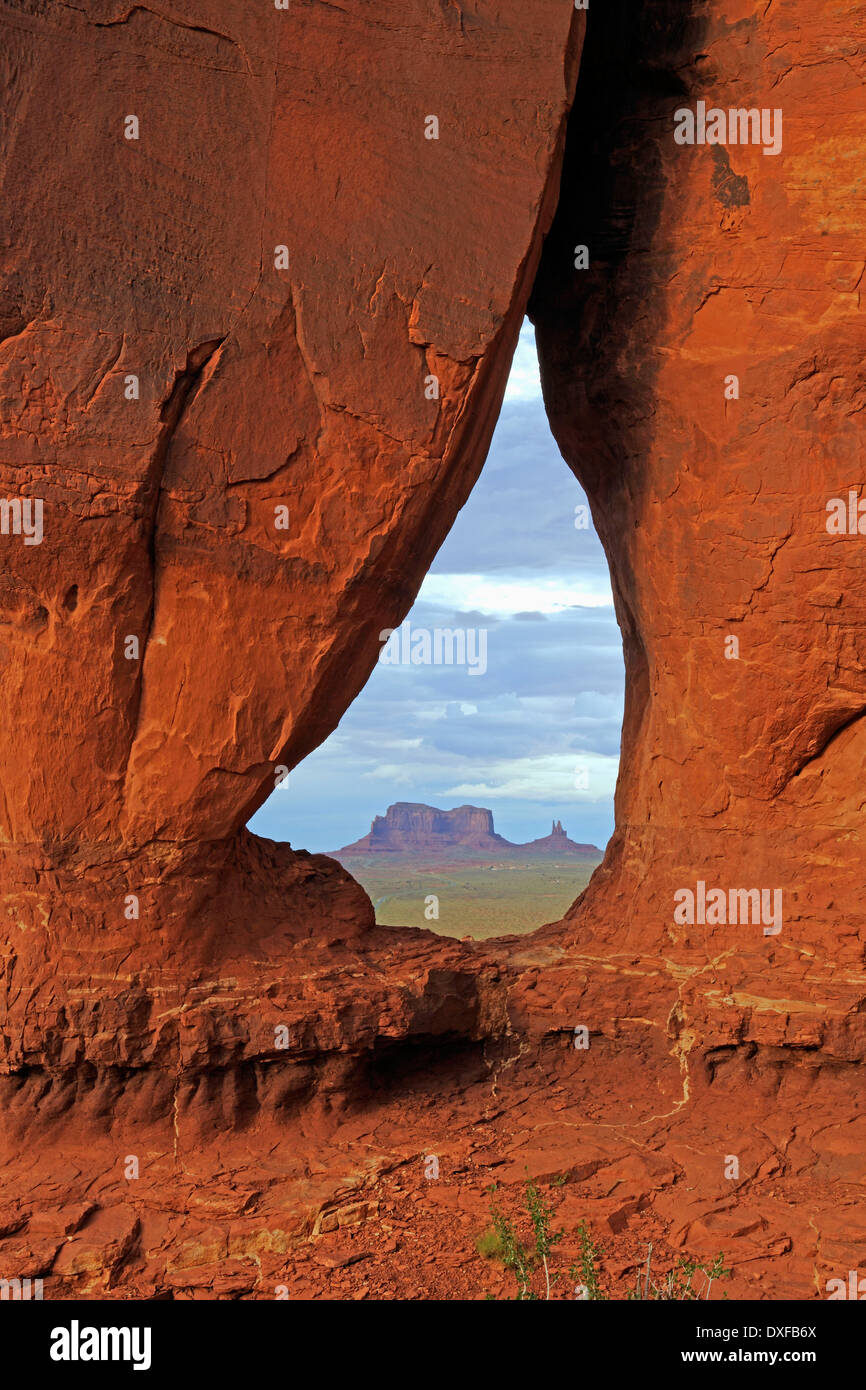 View through Tear Drop Arch towards the Mesas, Monument Valley, Arizona, USA Stock Photo