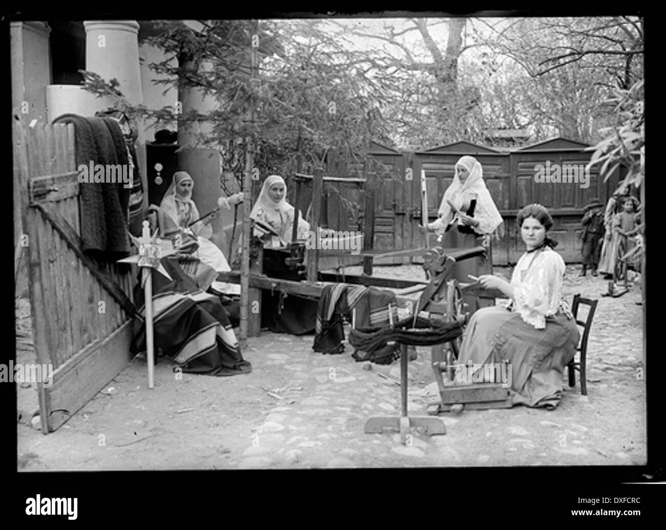 Romanian Women at looms Stock Photo - Alamy