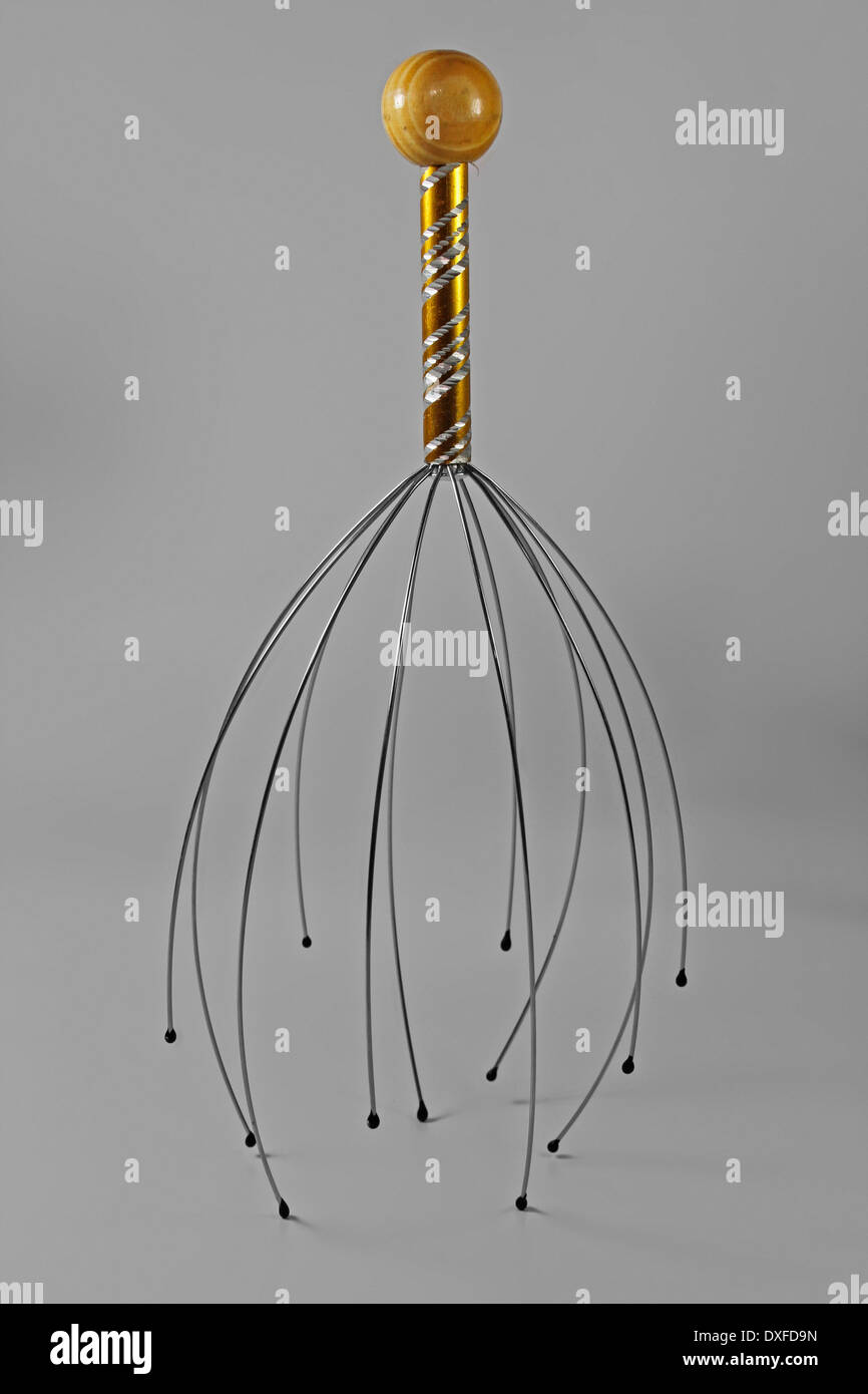 Manual head massager, metal head scratcher Stock Photo Alamy