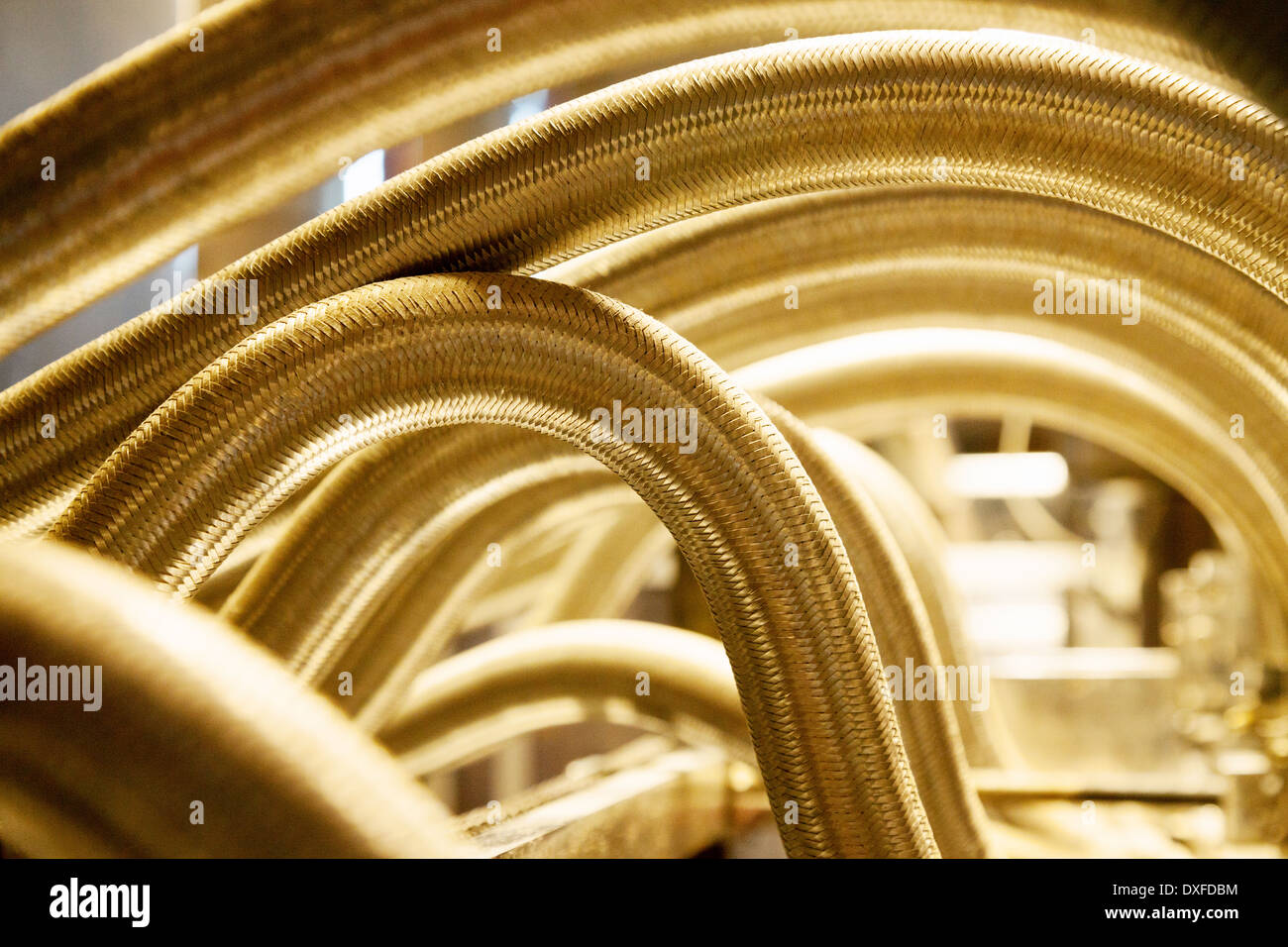 Pipes - part of factory machinery, close up, olive oil processing plant, Almeria Spain Stock Photo