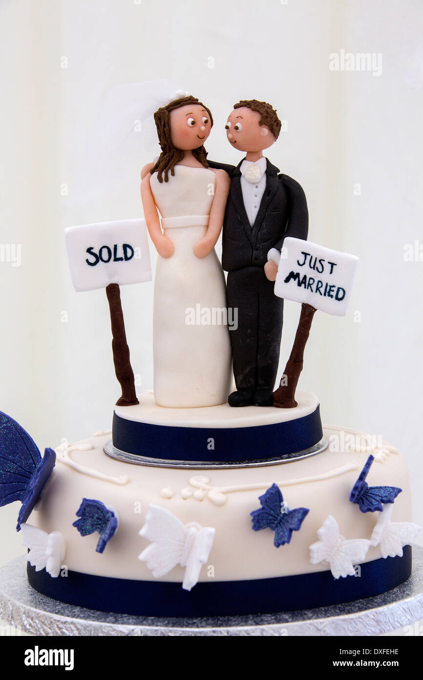 Decoration on the top of a wedding cake. Stock Photo