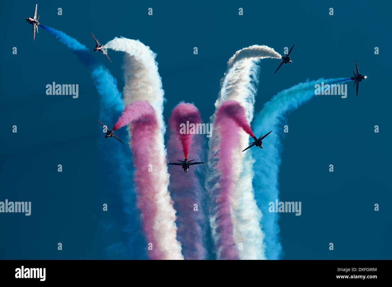 The RAF Red Arrows split directly overhead at during their display at RAF Waddington. Stock Photo
