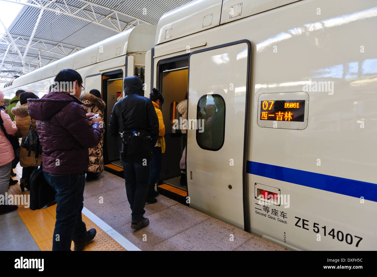 Embarking passengers of a high speed train at train station of Changchun.. Jilin Province, China Stock Photo