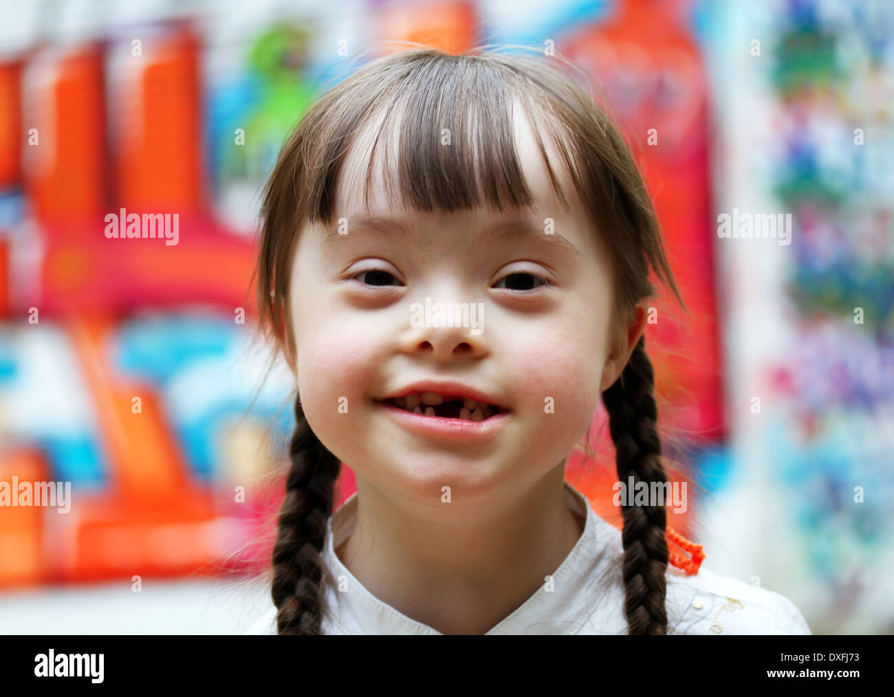 Portrait of beautiful young girl on the playground Stock Photo - Alamy