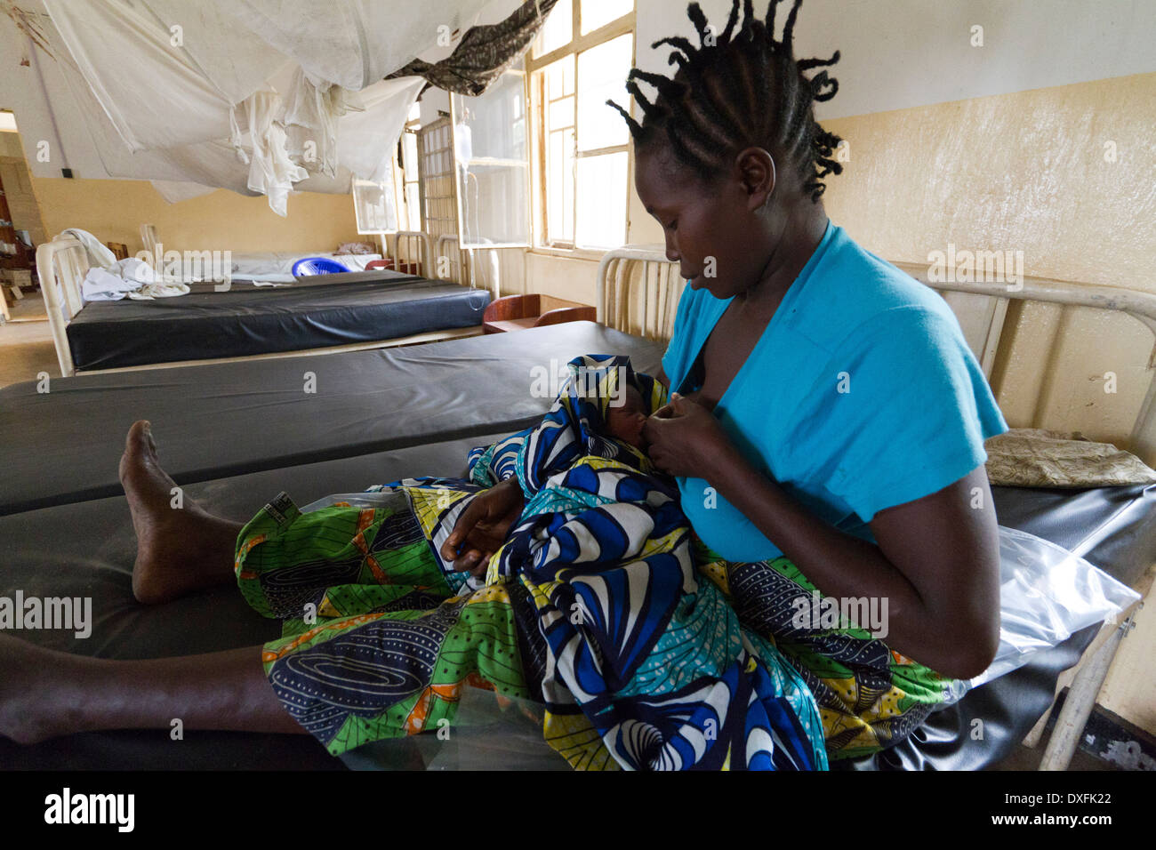 A young mother breastfeeding her baby in Kinyandonyi health center ,Rutshuru,North Kiwu ,DRC,Democratic Republic of Congo. Stock Photo