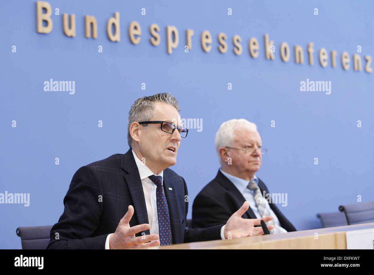 Berlin, Germany. 25th Mar, 2014. Press conference with president of German Red Cross, Seiters, team leader public welfare and social engagement of the German Red Cross, Betz, and the consultant, Bibisidis on the subject ''50 years voluntary social year. Figures and facts as well as political demands to the future of the volunteer's services in Germany'' at House of the German press conference in Berlin./Picture: Matthias Betz, team leader public welfare and social engagement of the German Red Cross, speaking aside Dr. Rudolf Seiters, president of the German Red Cross. (Credit Image: © Rey Stock Photo