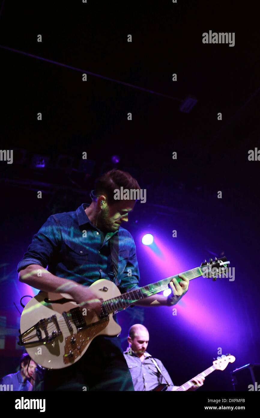 Frankfurt. 25th Mar, 2014. Johannes Strate (front) of the German rock band Revolverheld performs in the 'Always in Motion Tour 2014' at Batschkapp in Frankfurt, Germany on March 25, 2014. © Luo Huanhuan/Xinhua/Alamy Live News Stock Photo