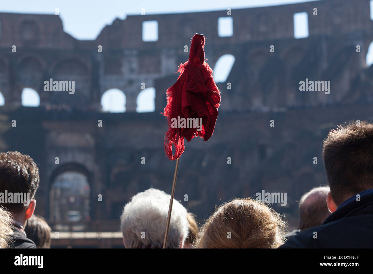 Tourist guide with red signal in the colloseum in Rome Stock Photo