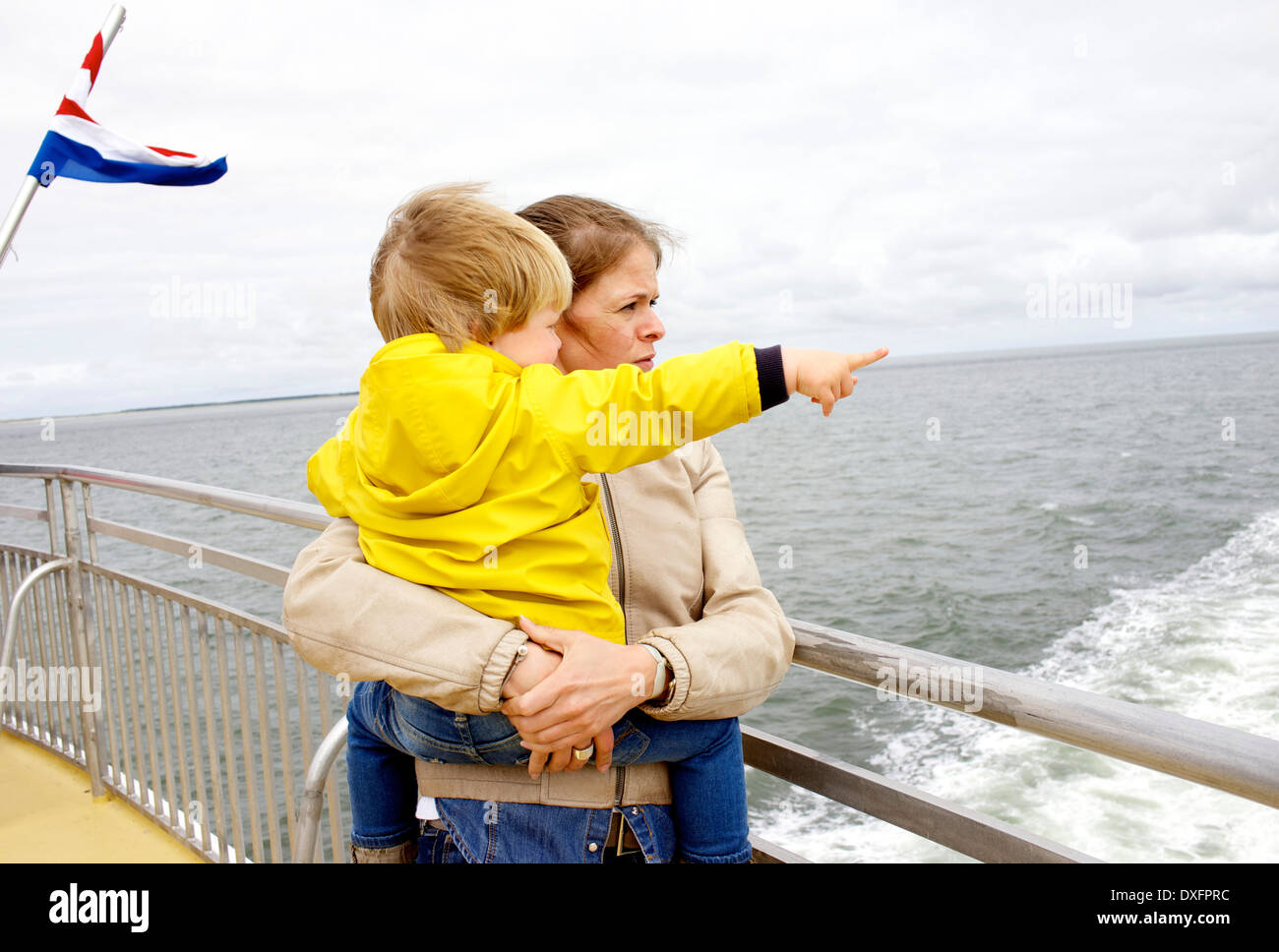 Mother and her son traveling to the Dutch Island of Vlieland Stock Photo