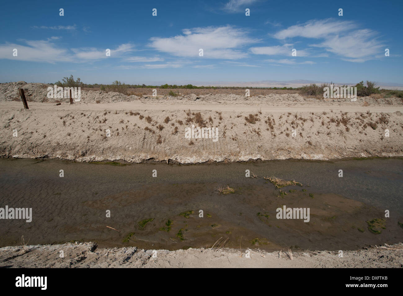 Mecca, California, USA. 21st Mar, 2014. A canal for irrigation runoff