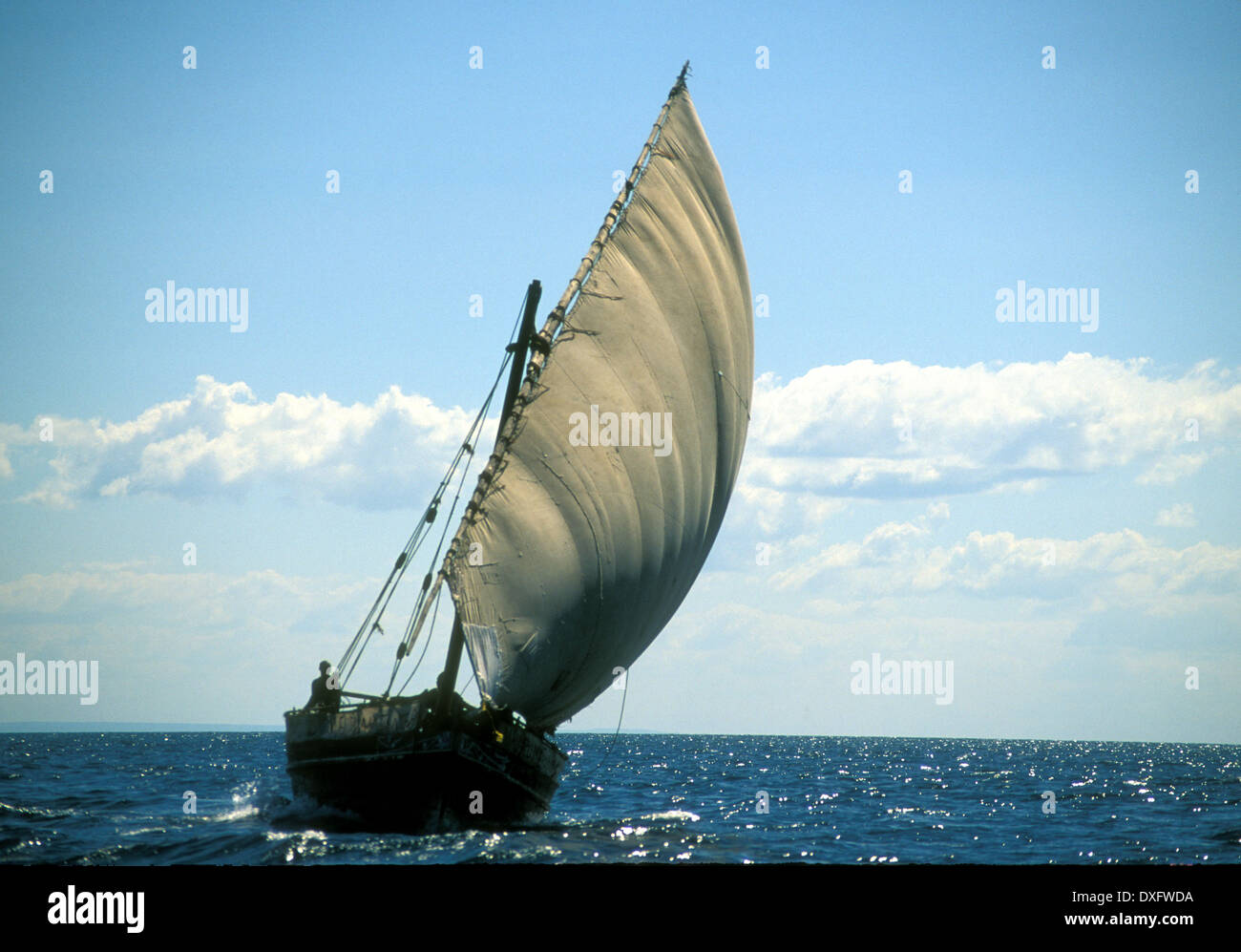 Lateen rig dhow sailing off Zanzibar, East Coast of Africa Stock Photo
