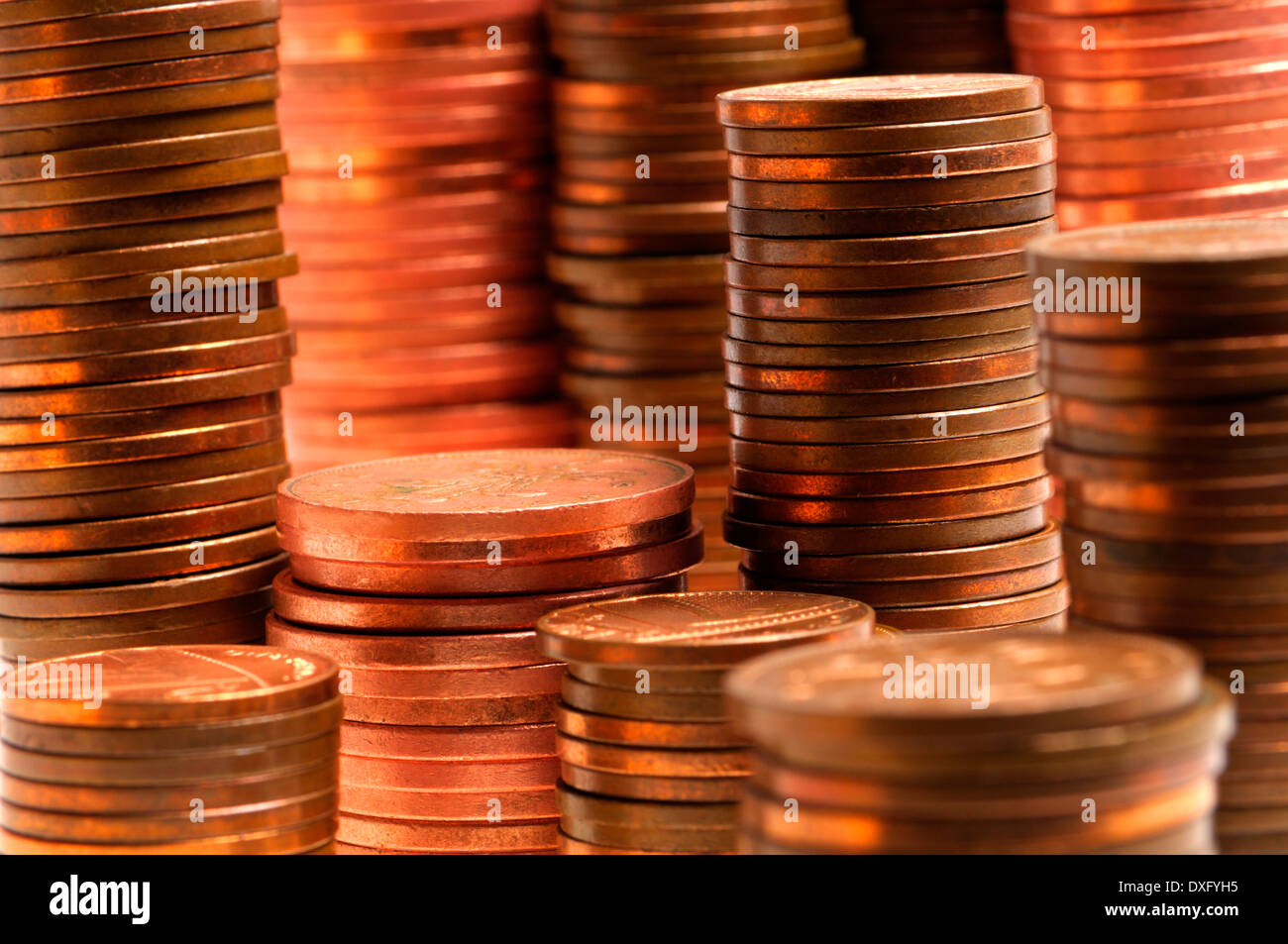 Piles of coins (British 1p and 2p) Stock Photo