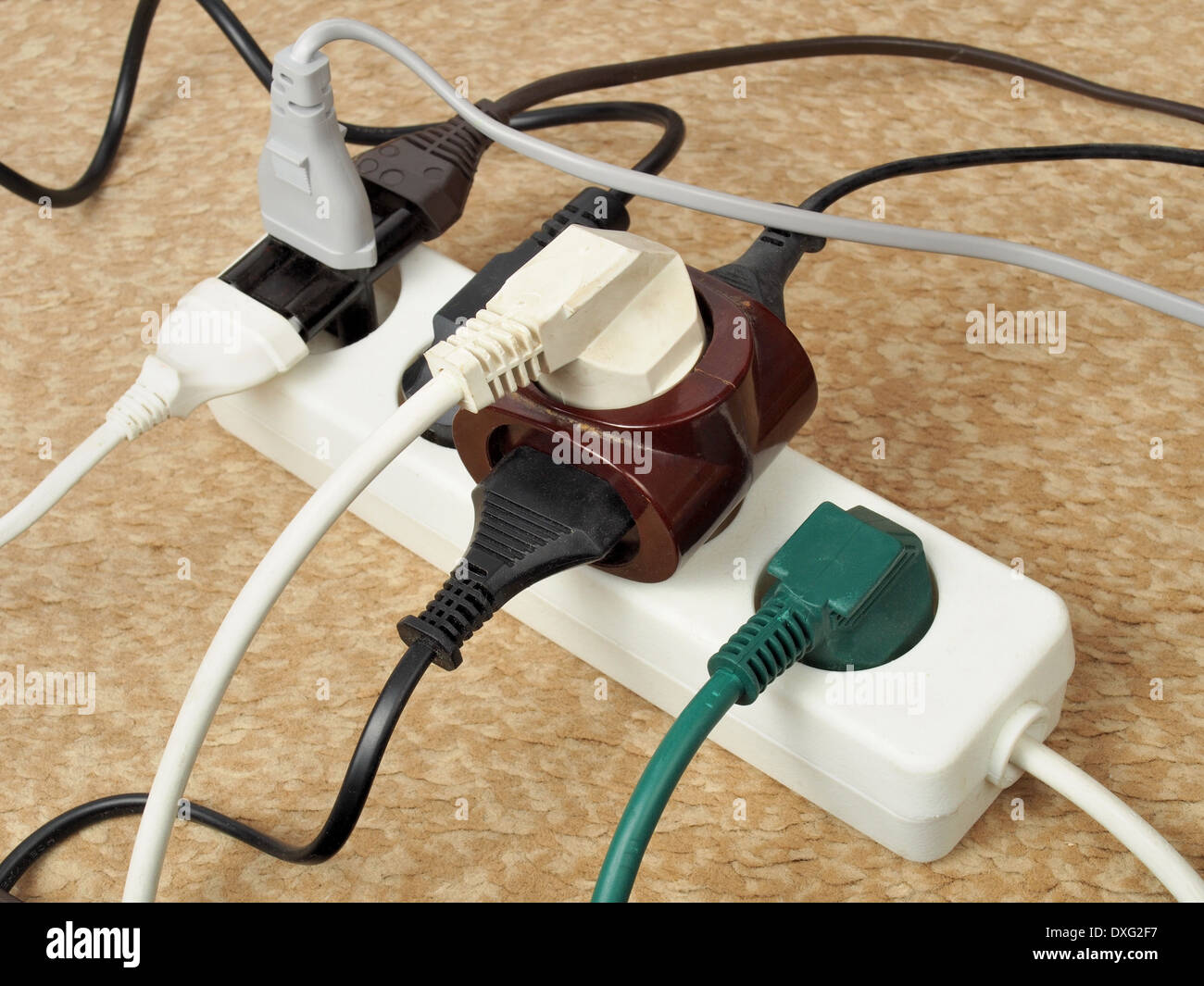Overloaded extension cord Stock Photo Alamy