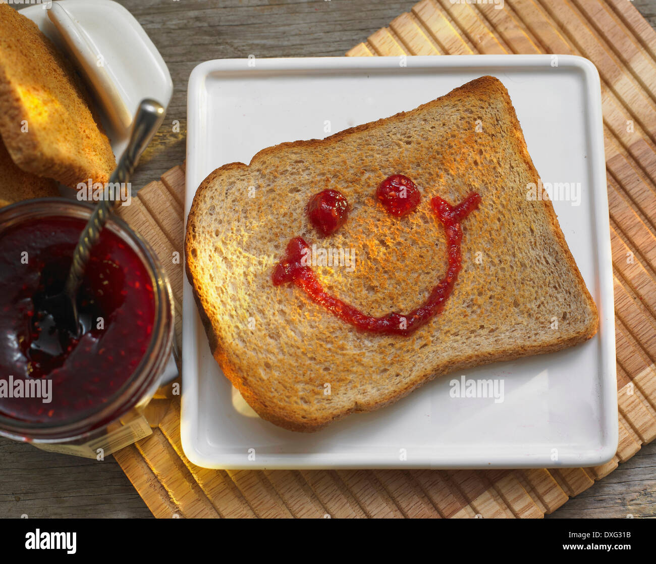 Slice Of Toast With Happy Face In Jam Stock Photo Alamy