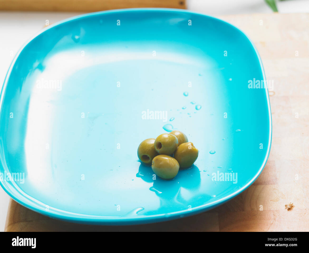 Plate Of Fresh Green Olives Stock Photo