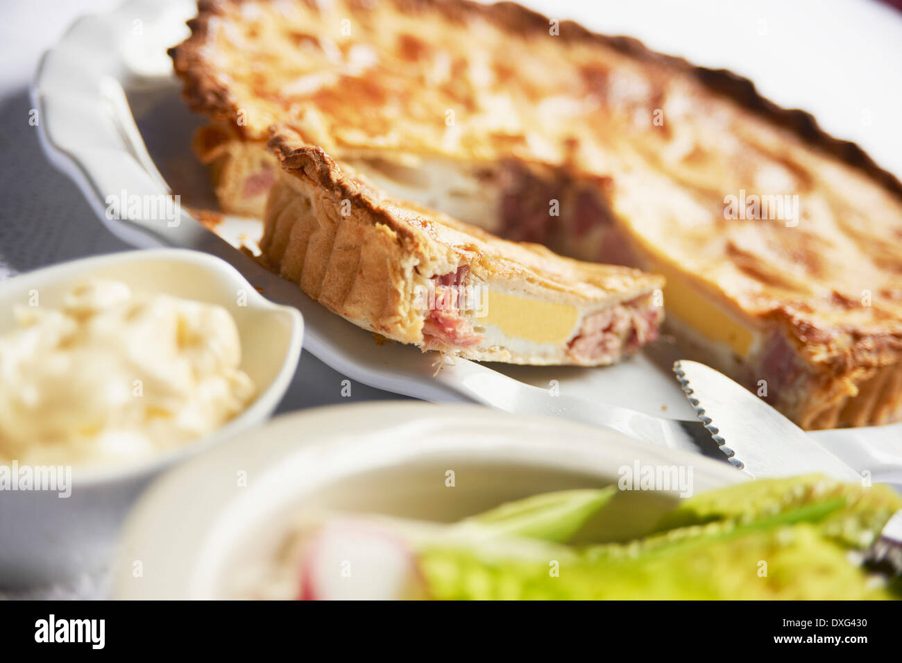 Homemade Ham And Egg Pie On Plate Stock Photo - Alamy