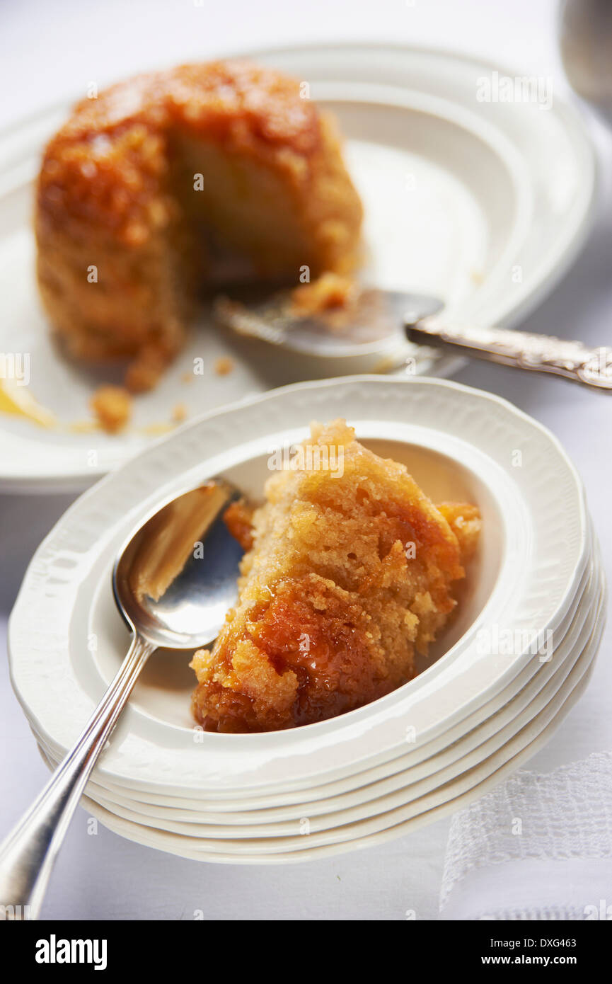 Bowl Of Steamed Syrup Pudding With Jug Of Custard Stock Photo - Alamy