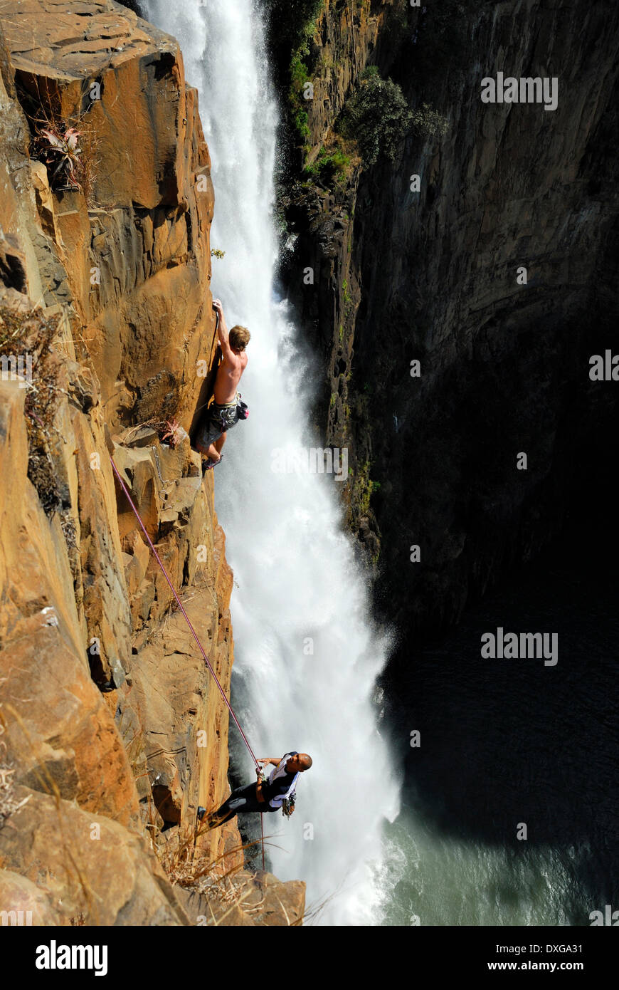 Rock climbers at Howick Falls, KZN Stock Photo