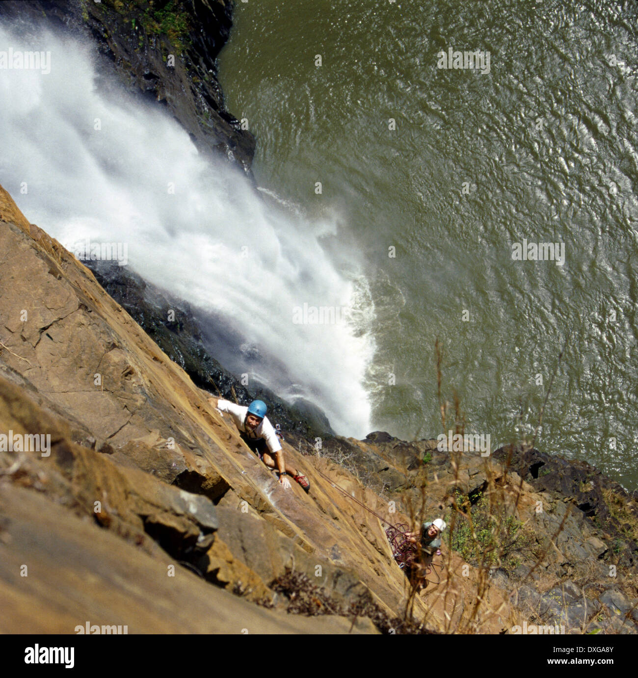 Rock climbing at Howick Falls Stock Photo Alamy