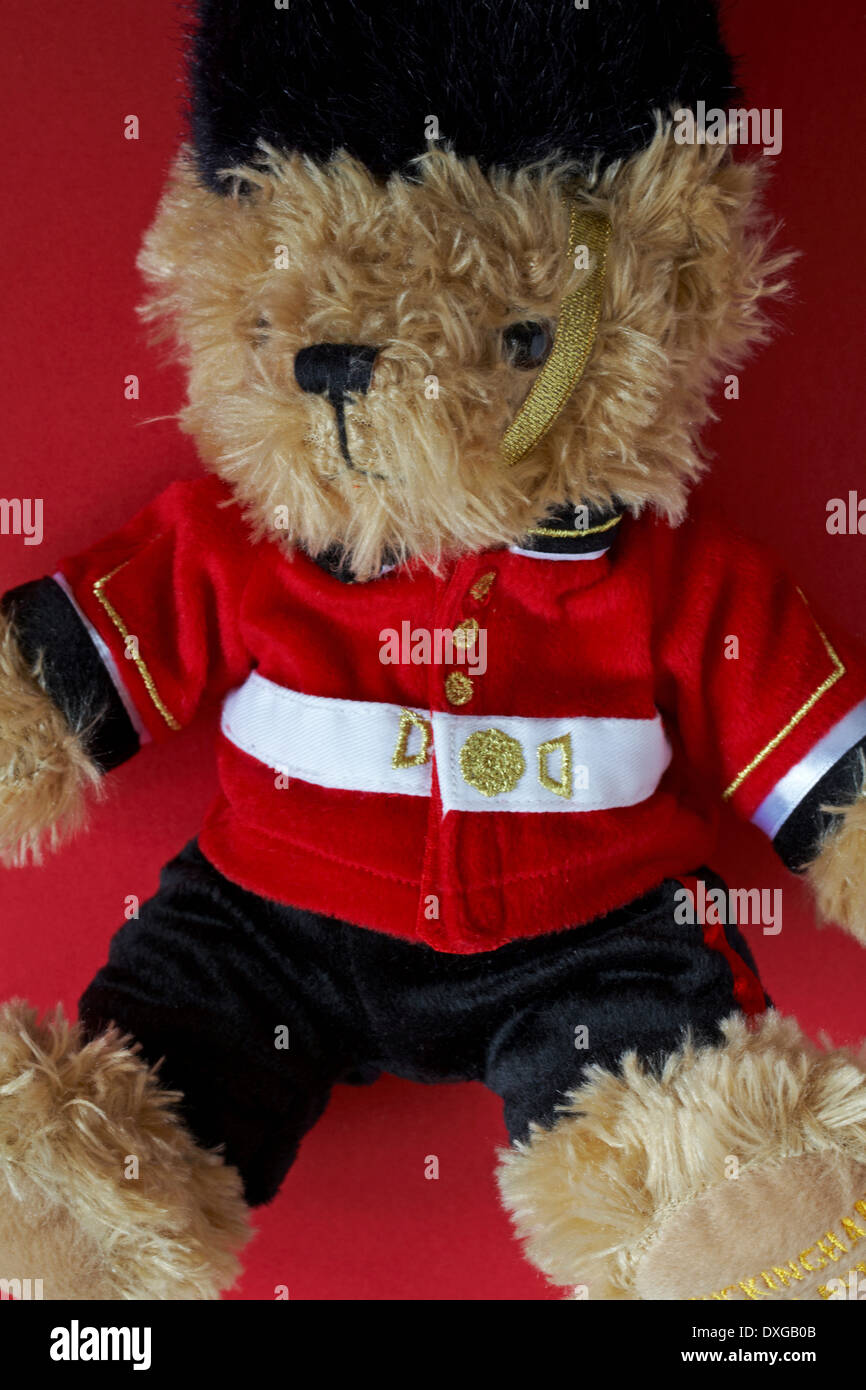 Buckingham Palace beefeater soldier guard Teddy bear set on red background Stock Photo