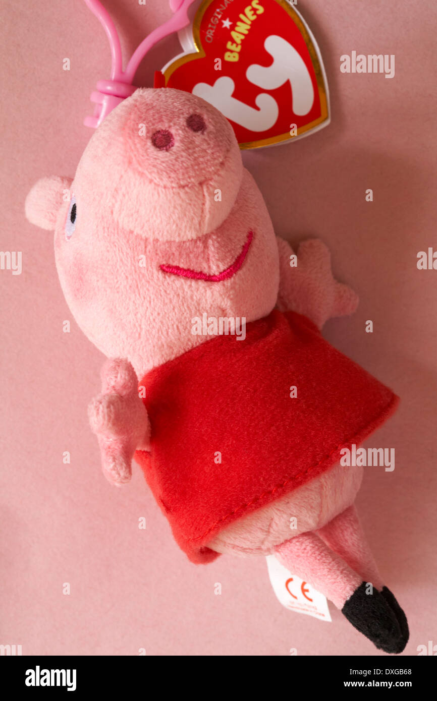 Peppa Pig ty original beanies beanie set on pink background Stock Photo